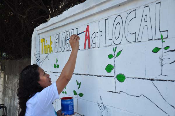 Analeh Patindol Analeh Patindol giving color to the theme of the mural